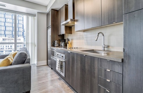 Wellington Place Condo | Beautiful 3 Bedroom 2 Bath Condo Suite - Fully Equipped, Fully Furnished