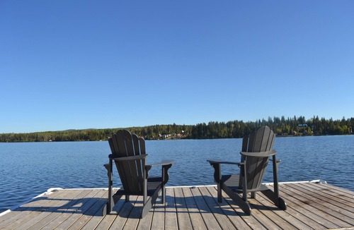 Deka Lake House | Beautiful modern house on Deka Lake with private dock and hot tub.