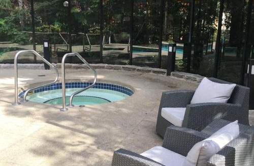 Village North Apartment | Beautiful Whistler Village Alpenglow suite queen size bed air conditioning cable and smartTV WIFI fireplace pool hot tub sauna gym balcony mountain views