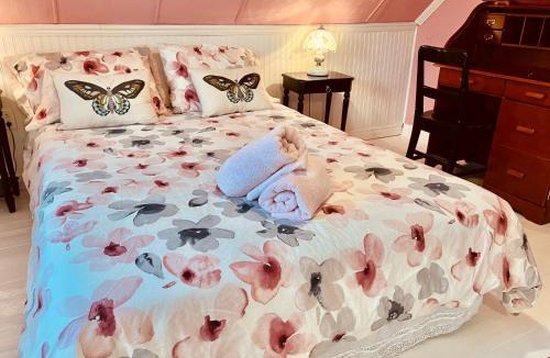 Grandes-Bergeronnes Bed & Breakfast | Bed & café Petit Papillon