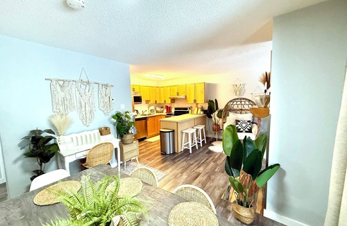 East Kootenay Condo | Boho theme, Ground floor patio with green space and creek view. 2 min to gondola