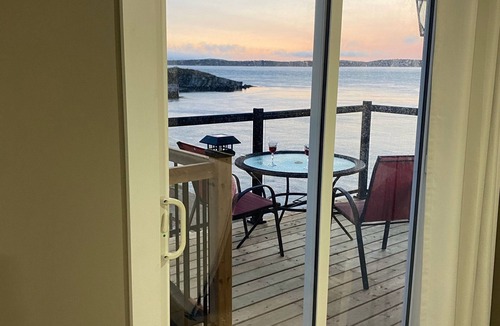 Wilsons Beach Apartment | Brand New Oceanfront Sunset Suite in Wilson’s Beach
