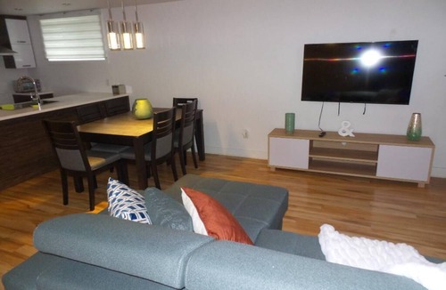 Mirabel Apartment | Bright room in a 3 and a half with sofa bed to rent for your stays