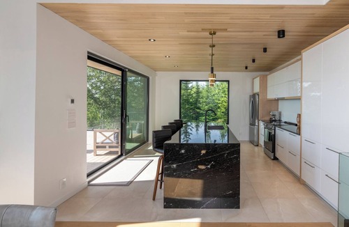 Petite-Riviere-Saint-Francois Ski Chalet | Altéa Charlevoix - luxury villa: spa, pool, billiards, view