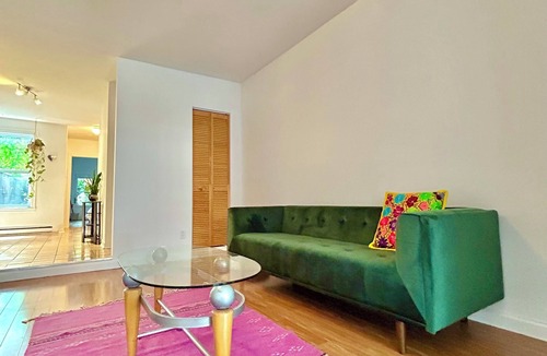 Mile-Ex Apartment | Casa Tierra: Minimalist Garden Apartment in Mile-Ex