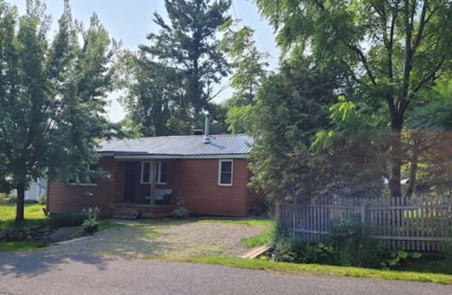 Lac-Brome Ski Chalet | Chalet Lac Brome, close to the lake with fireplace in the living room and swimming pool