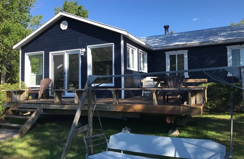 L'Anse-Saint-Jean Ski Chalet | Chalet on the side of water in a beautiful village