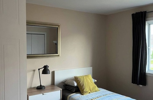Laval Apartment | Charming 2-bedroom apartment with WiFi, AC in peaceful Laval
