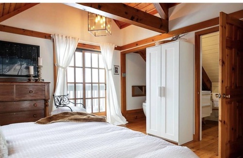 The Blue Mountains Ski Chalet | Charming 4 Bedroom Chalet located on a 1-acre lot w/hot tub.