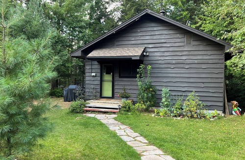 Dwight Cottage | Charming lakefront cottage with private dock, stunning sunsets & cozy wood stove