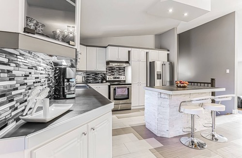 Prevost House | Cheerful 4 bedroom home with in-ground heated pool