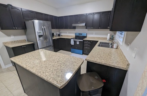 Alcona House | Cheerful 4 Bedroom house with indoor fireplace