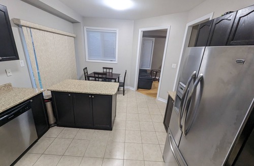 Alcona House | Cheerful 4 Bedroom house with indoor fireplace