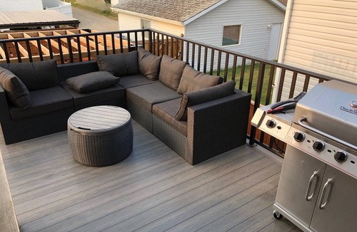 Red Deer House | Cheerful, cozy 4 bedroom house w/hot tub and firepit area