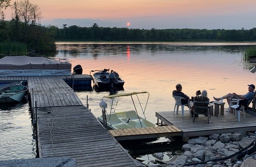 Trent Lakes Cottage | Cheerful new 3 bedroom cottage on the water with beautiful sunset view