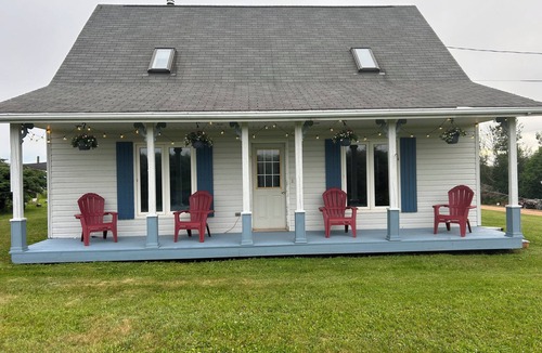 Souris Cottage | Close to Beach and Town of Souris. Quaint cottage with lovely log cabin feel.