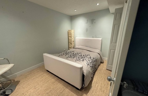 East Village House | close to stampede, private room and bathroom in the basement, a small living