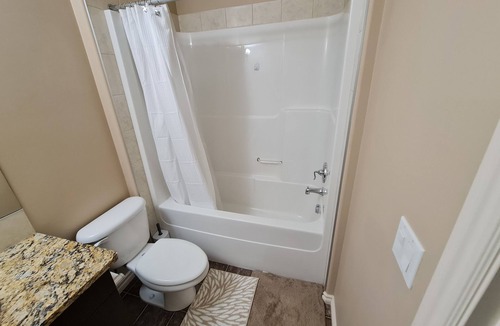 Southeast Edmonton House | Contemporary & Cheerful 1-Bedroom Suite with Fireplace