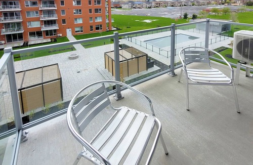 Brossard Apartment | Corporate Stays - 5mins from Walmart Modern 1BR at Blum with Premium Amenities