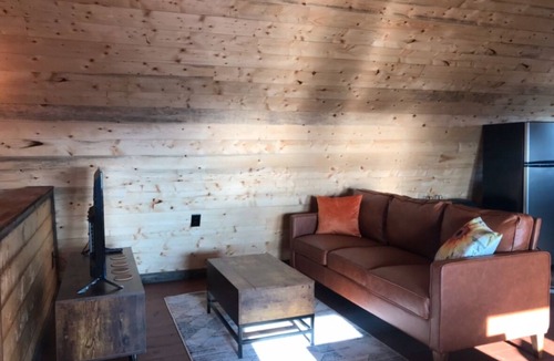 Tignish House | Cosy loft escape. A sandy beach across the street with ocean views.nPet friendly