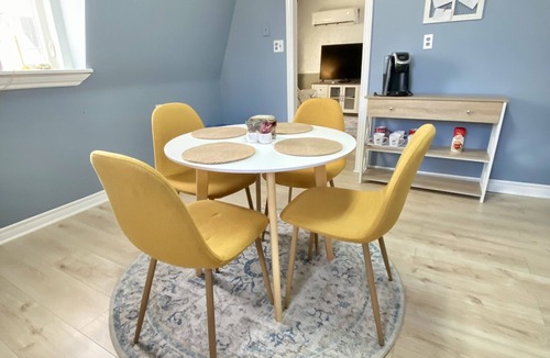 Yarmouth Apartment | Cosy, quiet butterscotch apartment on Doane with hot tub