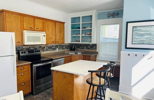 St. Andrews House | Cozy 2-bedroom cottage with two decks. Centrally located. Pet-friendly.
