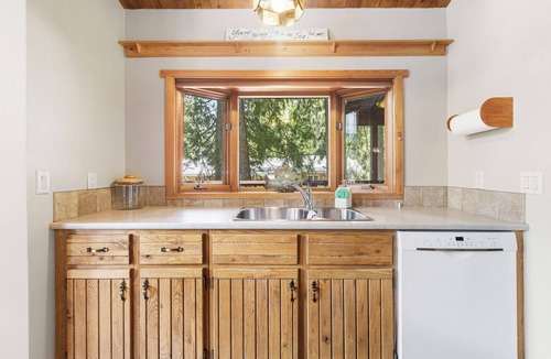Swansea Point Cabin | Cozy Beach Front getaway, with mountains and lake views all around.