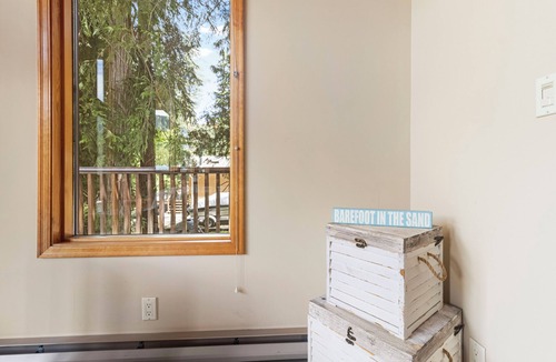 Swansea Point Cabin | Cozy Beach Front getaway, with mountains and lake views all around.