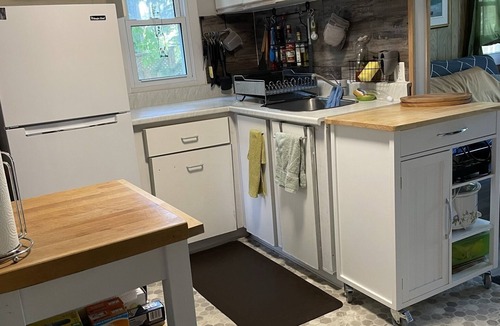 Alcona Cottage | Cozy cabin retreat steps to sandy, shallow beach