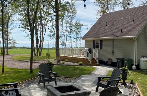 Borden-Carleton Cottage | Cozy cabin style cottage tucked into the woods with a view of the water.