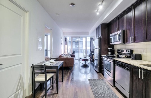Wellington Place Condo | Cozy Condo w/Balcony + Workspace in Downtown