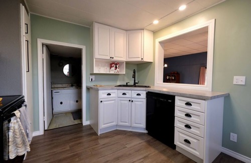 Port Burwell House | Cozy Corner Retreat - Pool, Sunroom, 0.7 Acres, 5 Minutes to the Beach