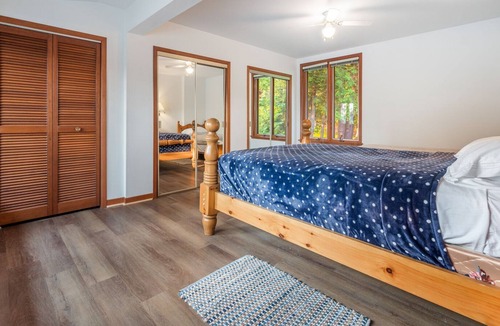 Wymbolwood Beach Cottage | Cozy Cottage Across from Blue Waters with Hot Tub!
