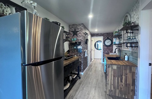 Eagle Bay Apartment | Cozy Country Retreat at the Baker Ranch with hot tub. Pet friendly. Lake view.