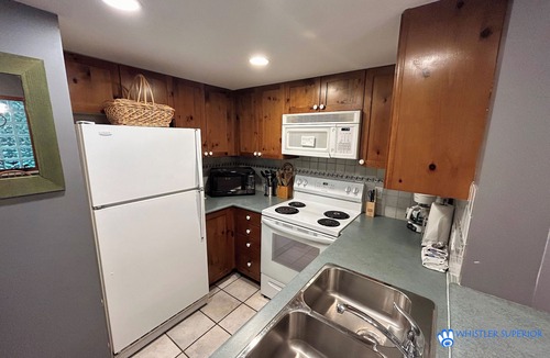 Village North Condo | Cozy Ground Floor, Free Parking, Pool and Hot Tub, Deck