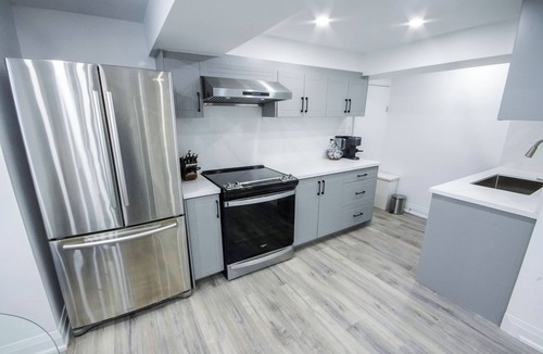 Brantford House | Cozy Hideaway - Private Lower Suite · 2BR · 2BA · Fireplace + Full Kitchen
