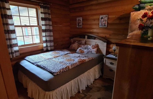 West Bay House | Cozy log cabin with fantastic views and 2 bathrooms