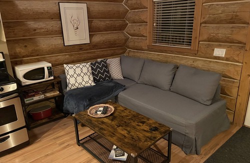 Lac Le Jeune Cabin | Cozy log cabin retreat with modern amenities
