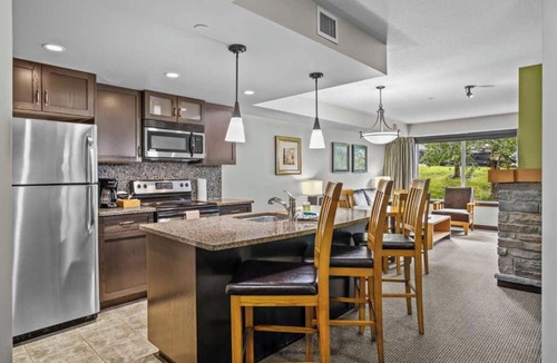Dead Man's Flats Apartment | Cozy Mountain Hideaway, King Bed, hot tub, free parking, Wi-Fi, up to 4 people!