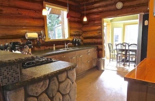 Otter Point Cottage | Cozy Rustic Log Home Living With Wood Fireplace And Hot Tub