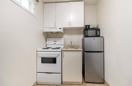 Beresford Hotel | Danny’s Hotel Suites, SureStay Collection by Best Western