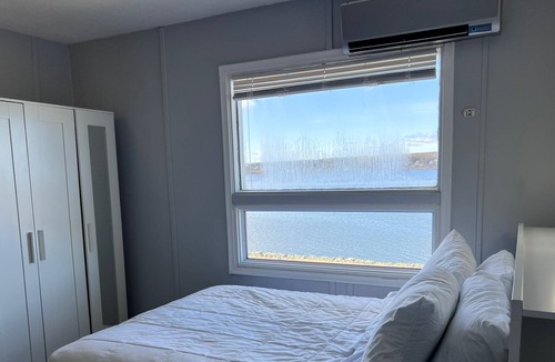 Sydney House | Deluxe Queen Room with beautiful views overlooking the water!