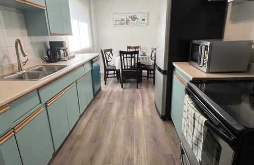 Northwest Edmonton House | Discover comfort with your family at this peaceful place to stay close to WEM.