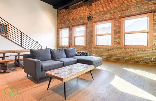 Historic Downtown Fernie Apartment | Downtown Loft with Rooftop Hot Tub by StayIn