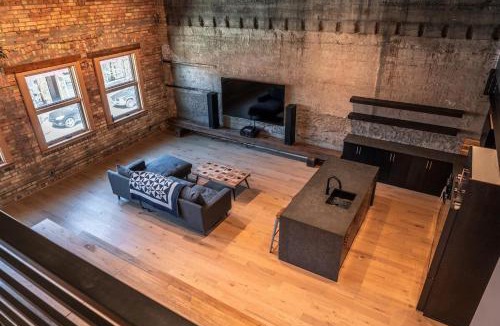 Historic Downtown Fernie Apartment | Downtown Loft with Rooftop Hot Tub by StayIn