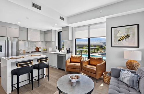 South Pandosy Condo | Enjoy a luxurious 2-bedroom retreat featuring two comfortable queen beds and a prime location just steps from Okanagan Lake. Perfect for a relaxing getaway with modern comforts and easy access to the beauty of the lake.