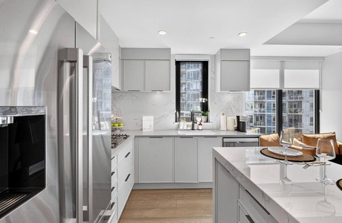 South Pandosy Condo | Enjoy a luxurious 2-bedroom retreat featuring two comfortable queen beds and a prime location just steps from Okanagan Lake. Perfect for a relaxing getaway with modern comforts and easy access to the beauty of the lake.