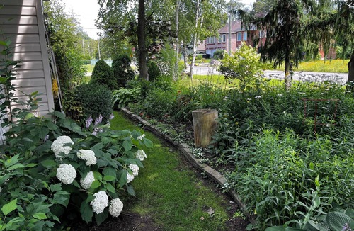 Alcona Cottage | Enjoy cottage living. Just a short walk away from the beach!