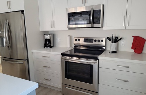 North Rustico House | Family-sized townhouse. Just minutes to the beach, golf courses & much more.