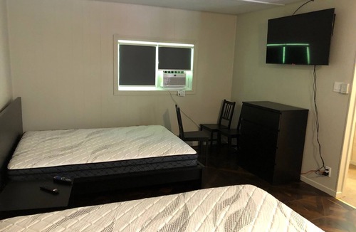 Dorset Apartment | Firehouse lodge Walk out Deck unit 1 On 8 Acres, 10 min Walk To The Lake